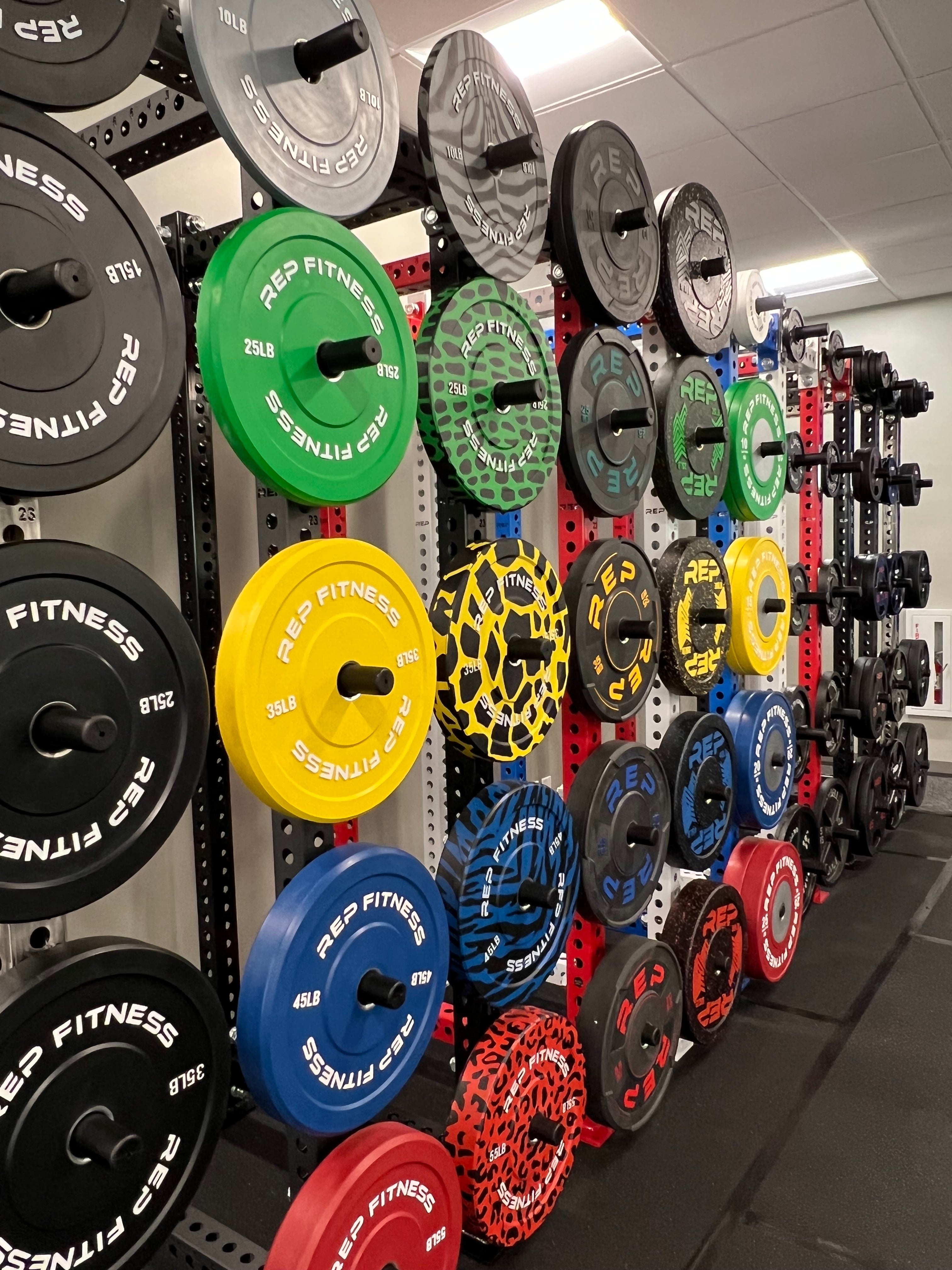 Weight Plates Being Displayed In Showroom